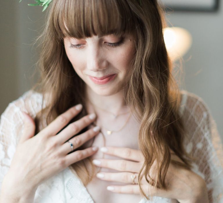 Bride in Grace Loves Lace Verdelle Dress with V-Neck, Low Square Back, Mid-Thigh Front Split and Lace Cape | Foliage Hair Crown | Missoma Necklace | Neon Sign and Marine Green Rewritten Bridesmaids Dresses with Lace Cape Grace Loves Lace Gown | Alain Mbouche Photography