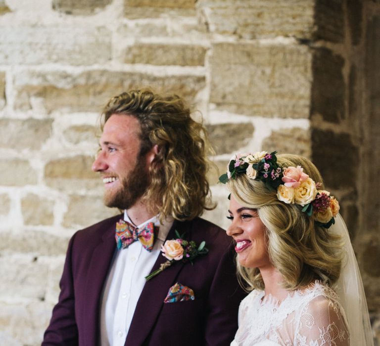 Bride in Separates and Flower Crown and Groom in Burgundy Suit