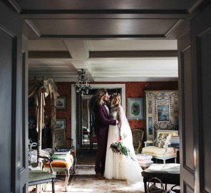 Bride in Separates and Flower Crown with Groom in Burgundy Suit