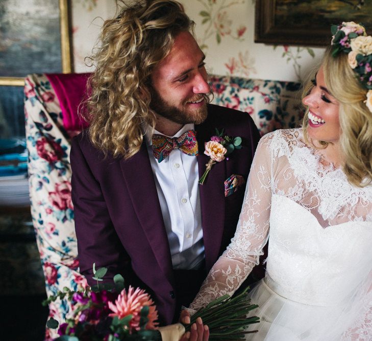 Laughing Bride in Separates and Flower Crown with Groom in Burgundy Suit