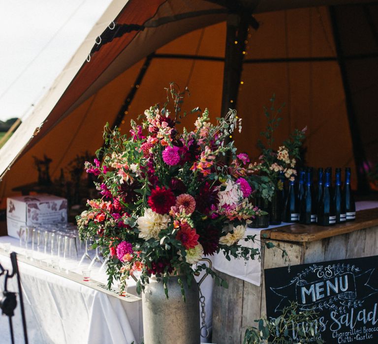 Milk Churn Filled with Pink and Red Wedding Flowers