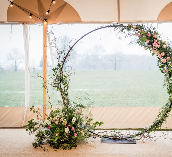 Floral Circle Photo Booth Backdrop // Sperry Tent Wedding With Romantic Meadow Inspired Styling