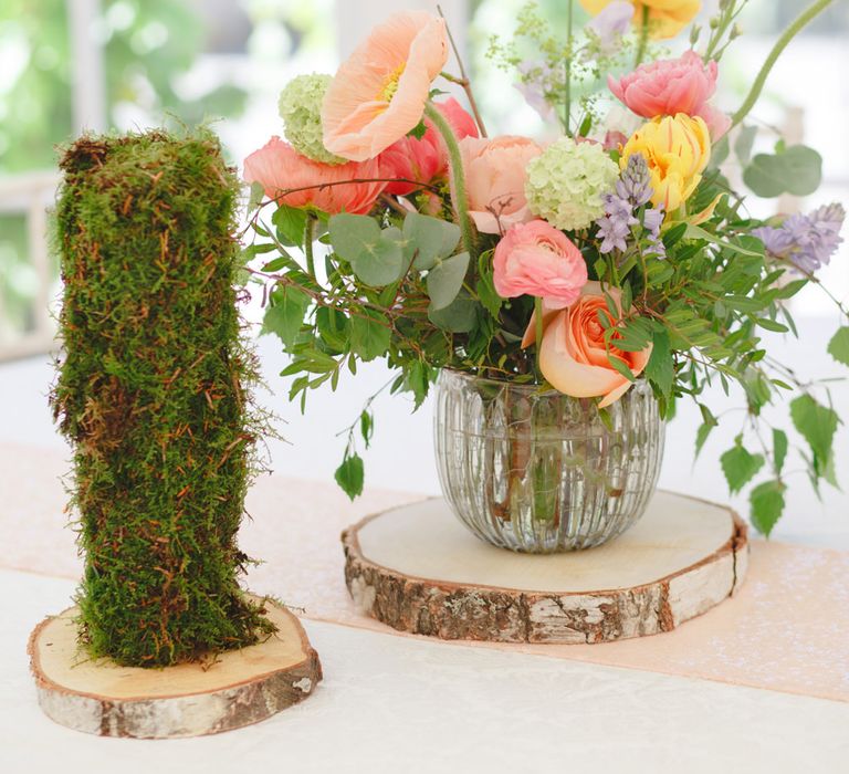 Colourful Floral Centrepiece | Spring Wedding Colours for 2019 | Bold &amp; Bright Spring Wedding Inspiration by Helaina Storey Wedding Design | Flowers by Bloomologie | Palette Signs by Made by Wood &amp; Wood | Claire Graham Photography