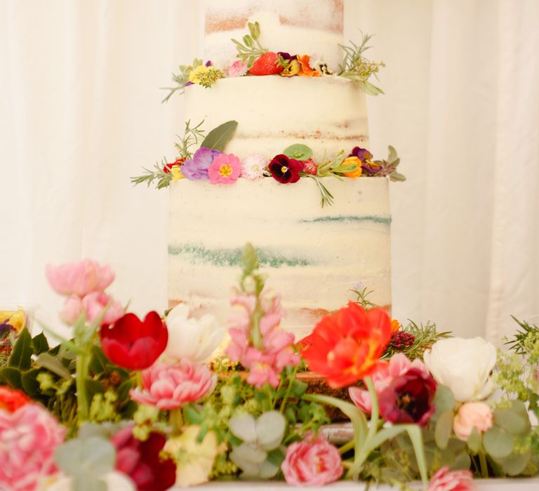 Semi Naked Wedding Cake with Spring Wedding Flowers | Spring Wedding Colours for 2019 | Bold &amp; Bright Spring Wedding Inspiration by Helaina Storey Wedding Design | Flowers by Bloomologie | Palette Signs by Made by Wood &amp; Wood | Claire Graham Photography