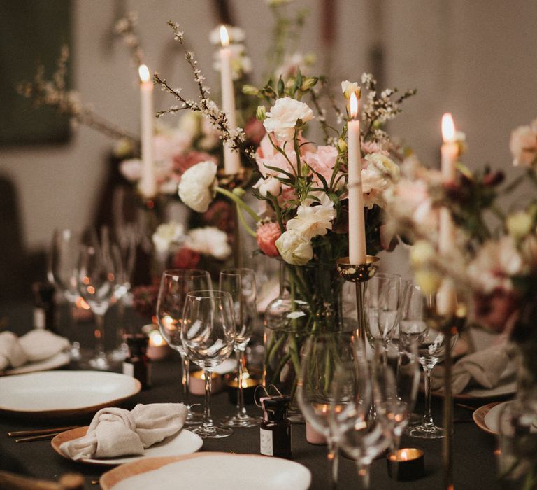 Boat House Wedding Reception With Pink Toned Florals And Ivory Tapered Candles // Images By James Frost Photography