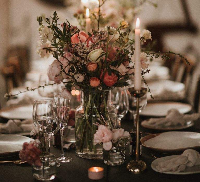 Boat House Wedding Reception With Pink Toned Florals And Ivory Tapered Candles // Images By James Frost Photography