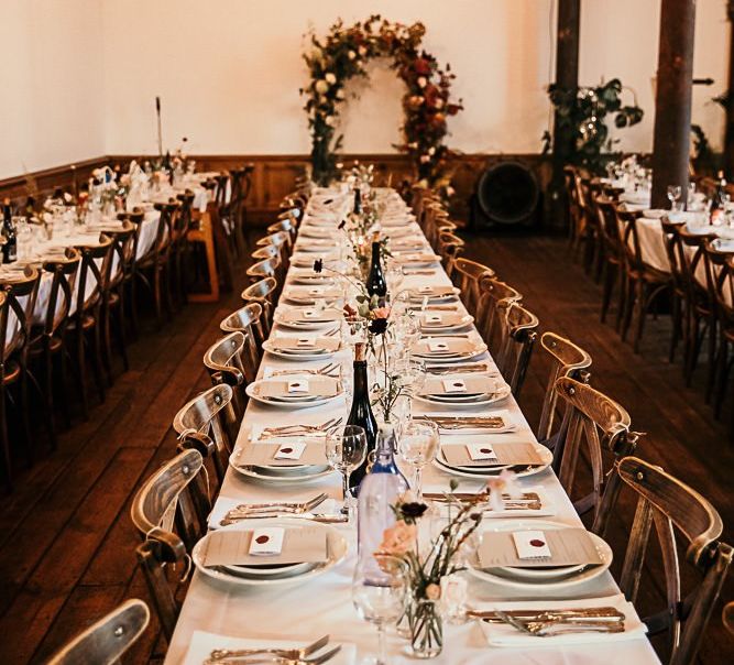 Reception decor with foliage details at Clapton Country Club wedding for botanical style celebration