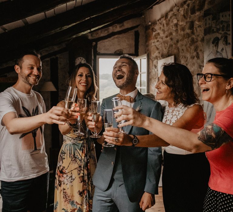 Groom celebrates with guests