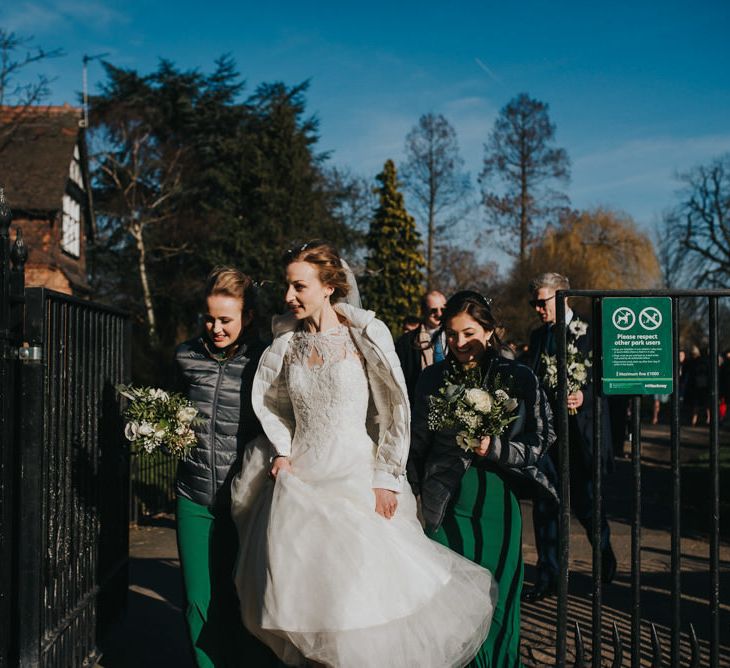 Bridal Party Wear Puffer Jackets // Winter Wedding at The West Reservoir Centre, Stoke Newington | Bride wears Maggie Sottero Dress | Bridesmaids in ASOS | Images by Remain In Light