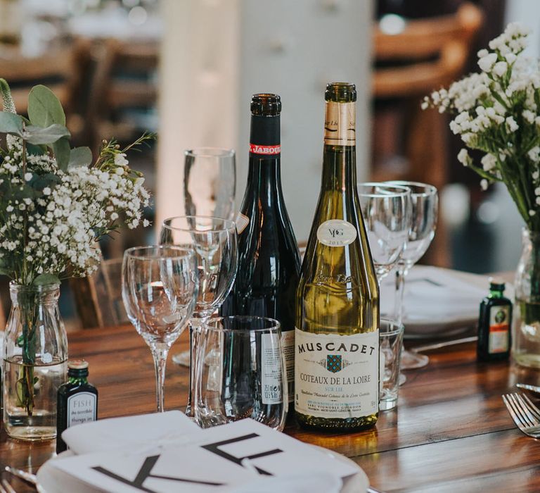 Glass Wear and Small Vases with White and Green // Table Decor Inspired By Bride and Grooms Love For Cycling // Images by Remain In Light