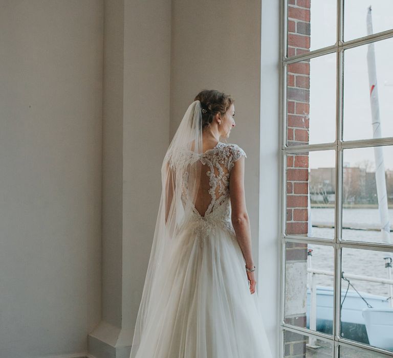 Bride wears Maggie Sottero Dress with Keyhole Back  // Images by Remain In Light