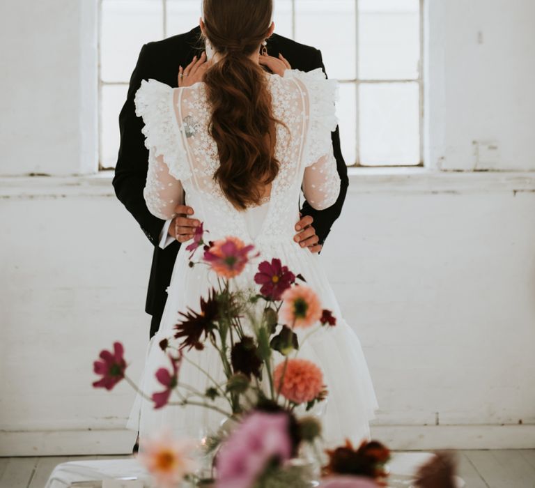 Bride with slick ponytail and head band