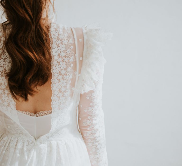 delicate lace wedding dress with low back detail