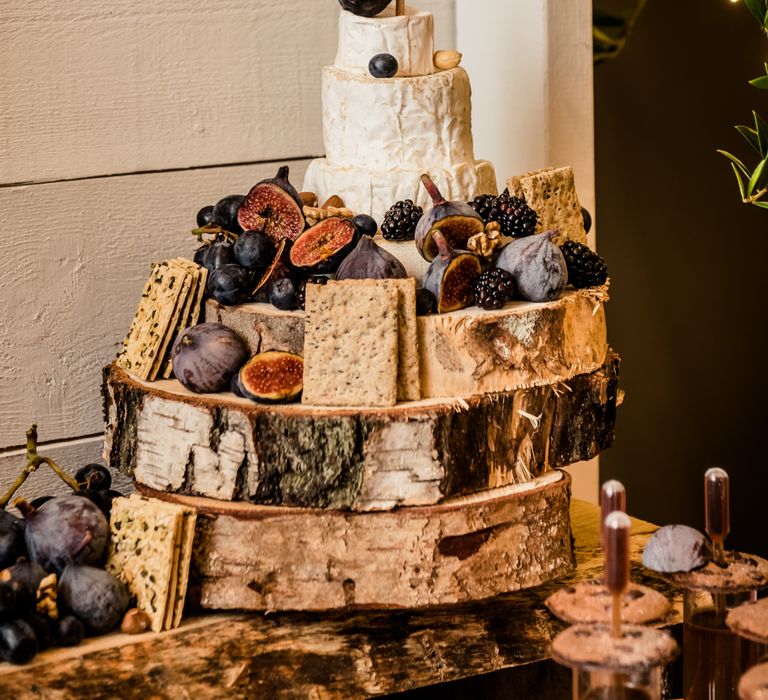 Cheese Tower For Wedding // Teepee Tent Wedding With Romantic Meadow Inspired Styling // PapaKata Spring Open Day // Images By Dominic Wright // Styling By Natalie Hewitt