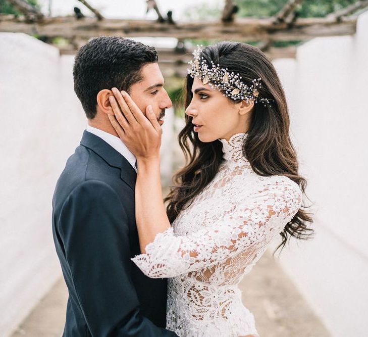 Bride in Lace three Quarter Sleeve Wedding Dress with Hair Vine and Groom in Dark Suit