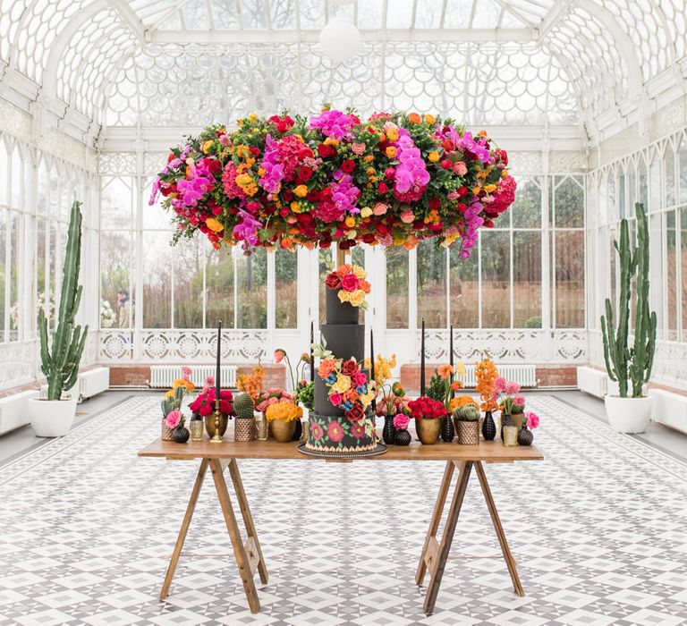 Delicate &amp; Feminine, and Bold &amp; Passionate Frida Kahlo Wedding Inspiration at Horniman Museum Glasshouse Venue | Styled by Anna Fern Events | Elizabeth’s Cake Emporium | Wild About Flowers | Joanne Fleming Design Gowns | Roberta Facchini Photography