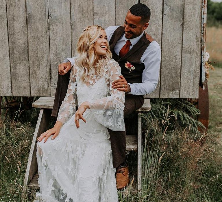 Boho Bride and Groom Sitting on a Shed Steps