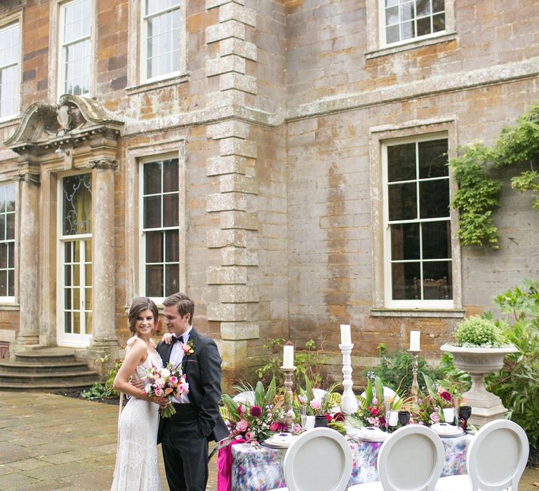 Outdoor Elegant Tablescape | Bride in Daughters of Simone Gown | Groom in Black Tie | Spring Equinox at Thorpe Manor Wedding Venue by Revival Rooms | Anneli Marinovich Photography