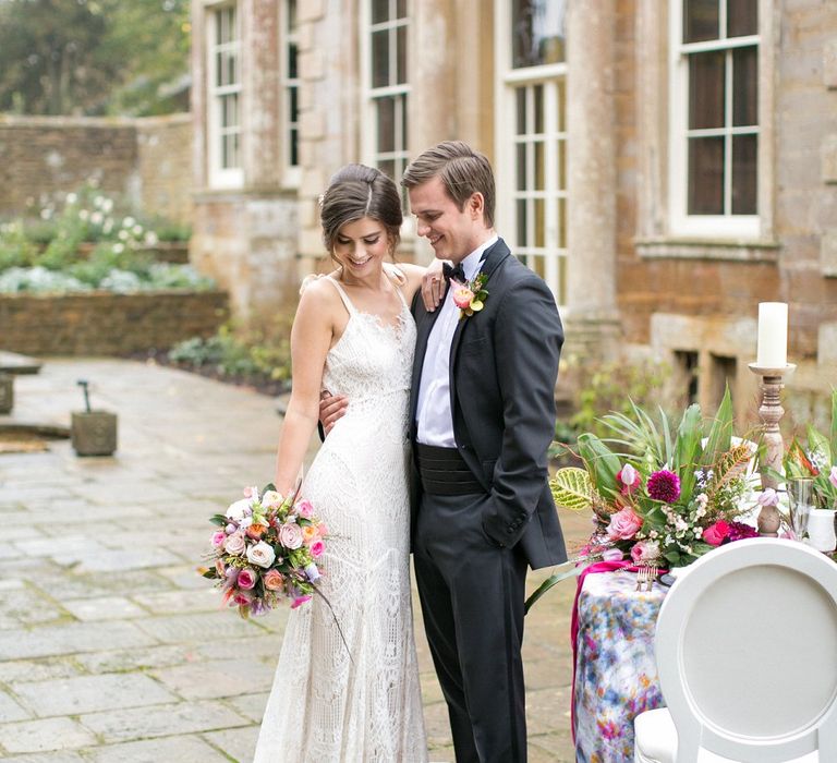 Outdoor Elegant Tablescape | Bride in Daughters of Simone Gown | Groom in Black Tie | Spring Equinox at Thorpe Manor Wedding Venue by Revival Rooms | Anneli Marinovich Photography