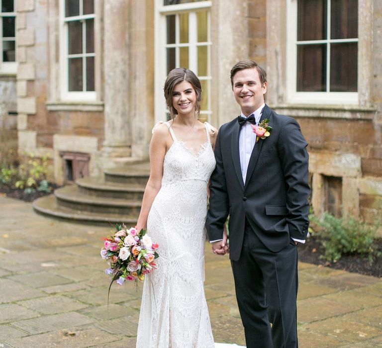 Bride in Daughters of Simone Gown | Groom in Black Tie | Spring Equinox at Thorpe Manor Wedding Venue by Revival Rooms | Anneli Marinovich Photography