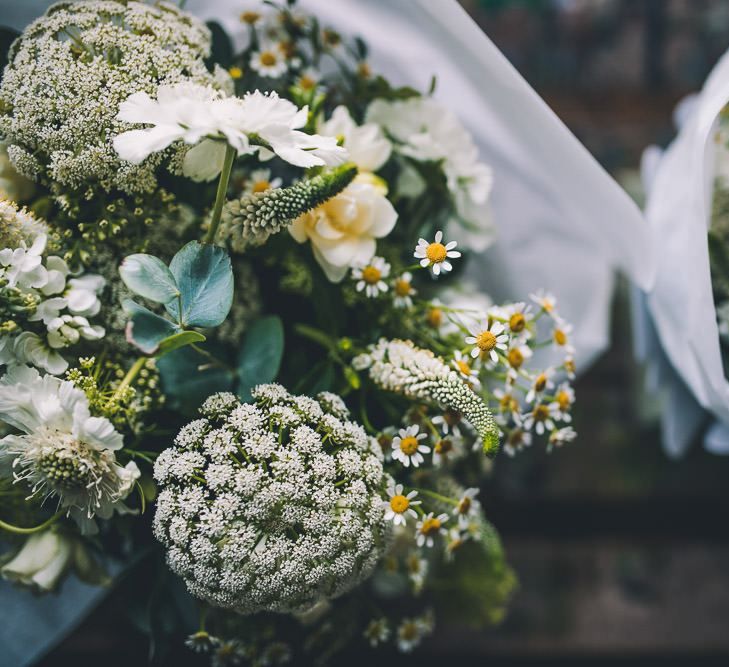 White floral bouquets for same-sex wedding in London with vintage styling and colourful decor