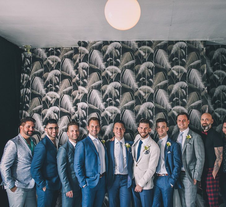 Party guests at intimate same-sex celebration in London with vintage decor and colourful styling