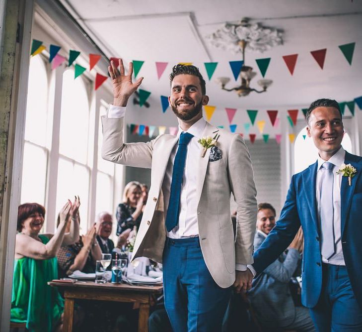 The Roost Dalston same-sex wedding reception with vintage decor and colourful bunting