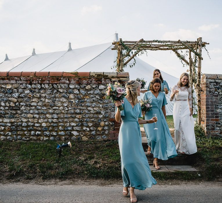 Bridesmaids In Marine Blue Wrap Dresses By Rewritten // Coastal Inspired Marquee Wedding With Bride In Bespoke Dress And Bridesmaids In Rewritten Wrap Dresses Images By Luis Holden