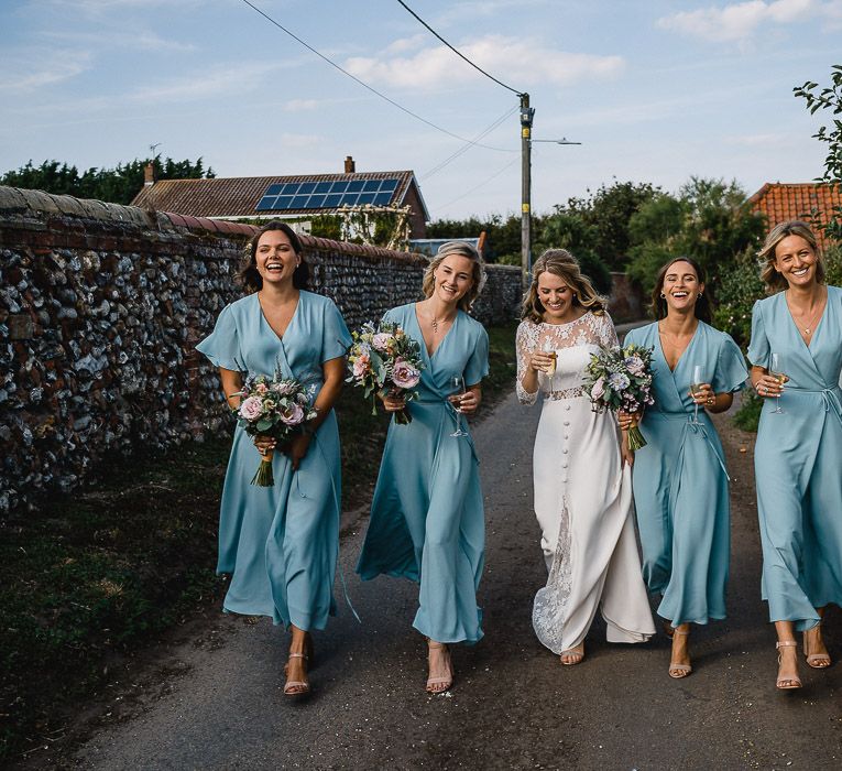 Bridesmaids In Marine Blue Wrap Dresses By Rewritten // Coastal Inspired Marquee Wedding With Bride In Bespoke Dress And Bridesmaids In Rewritten Wrap Dresses Images By Luis Holden