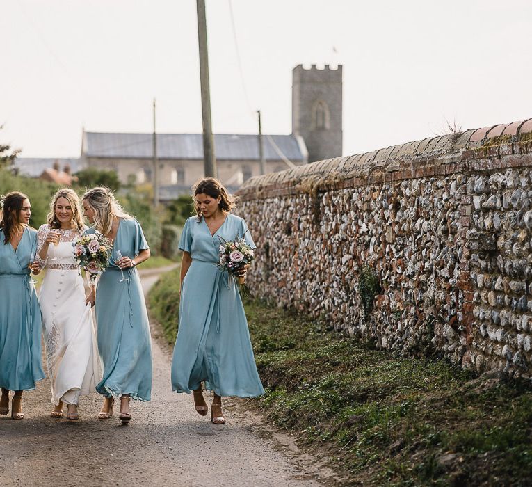 Bridesmaids In Marine Blue Wrap Dresses By Rewritten // Coastal Inspired Marquee Wedding With Bride In Bespoke Dress And Bridesmaids In Rewritten Wrap Dresses Images By Luis Holden