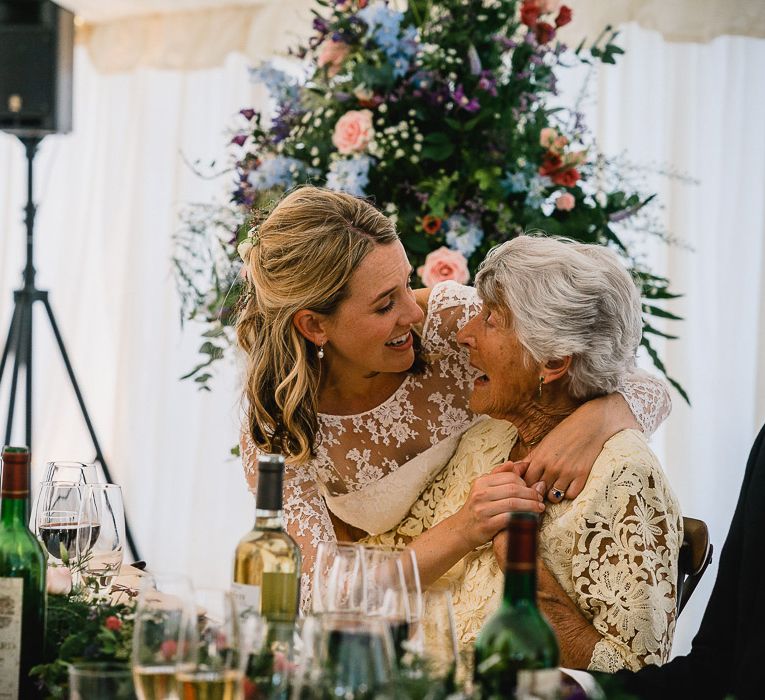 Bride In Bespoke Dress // Groom In Oliver Brown // Coastal Inspired Marquee Wedding With Bride In Bespoke Dress And Bridesmaids In Rewritten Wrap Dresses Images By Luis Holden