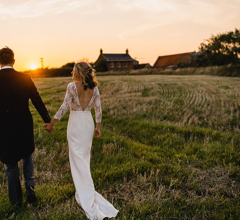 Bride In Bespoke Dress // Groom In Oliver Brown // Coastal Inspired Marquee Wedding With Bride In Bespoke Dress And Bridesmaids In Rewritten Wrap Dresses Images By Luis Holden