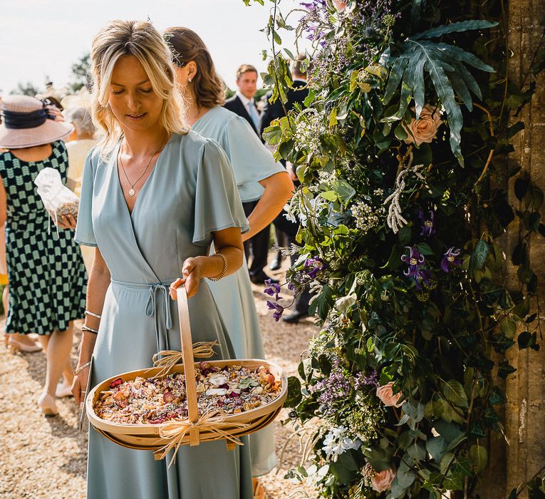 Dried Petal Confetti // Coastal Inspired Marquee Wedding With Bride In Bespoke Dress And Bridesmaids In Rewritten Wrap Dresses Images By Luis Holden