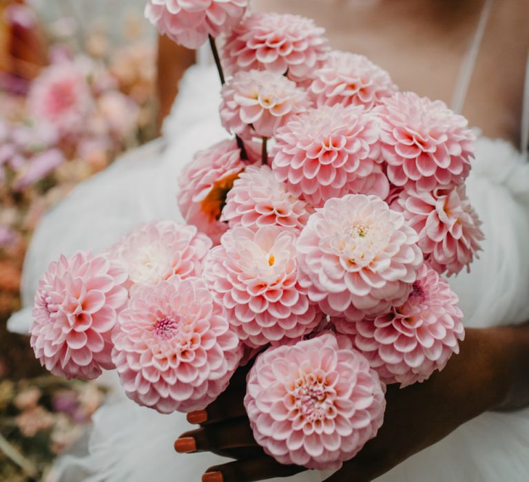 pink pompom dahlia bouquet for tropical wedding inspiration at Secret Garden Kent