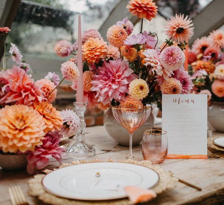 Colourful wedding flower centrepieces and details for intimate wedding at Secret Garden Kent