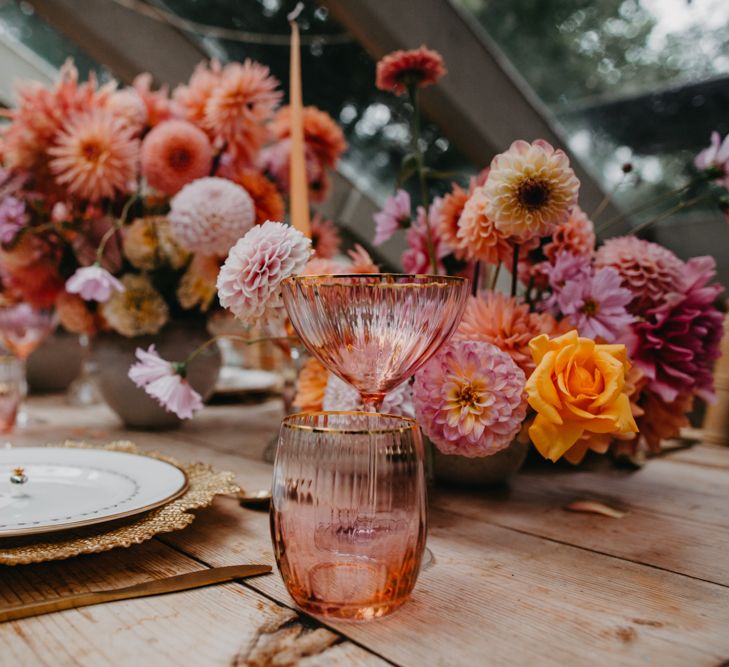 coloured glassware for tropical tablescape at Secret Garden Kent