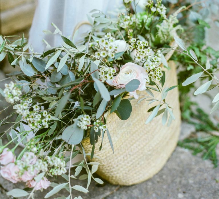 Straw Bag with Eucalyptus, Foliage and Pink Flowers