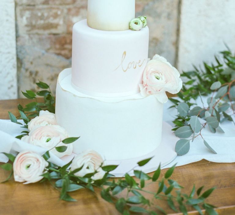 White, Pink and Ombre Royal Icing Wedding Cake with Flowers