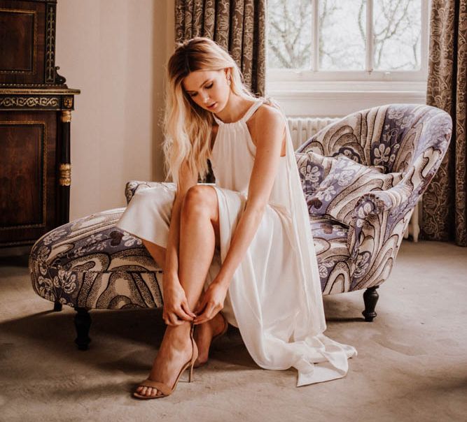 Bride getting ready at Iscoyd Park in Emma Beaumont wedding dress