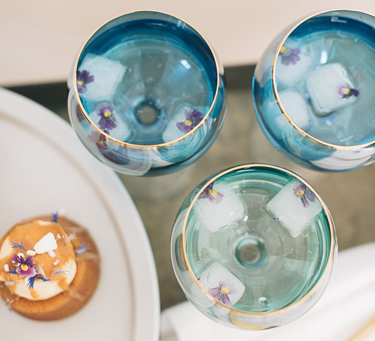 Gin &amp; Tonic In Coloured Balloon Glass By LSA With Pretty Edible Flower Cake By Cottonwood Bakery