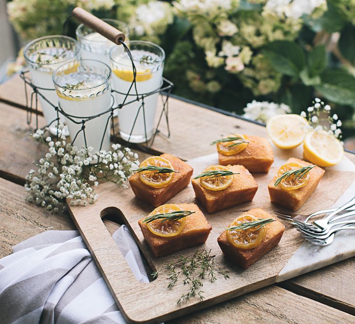 Mini Lemon Drizzle Loaves With Preserved Lemon &amp; Herb Garnish Served With Spiked Cloudy Lemonade