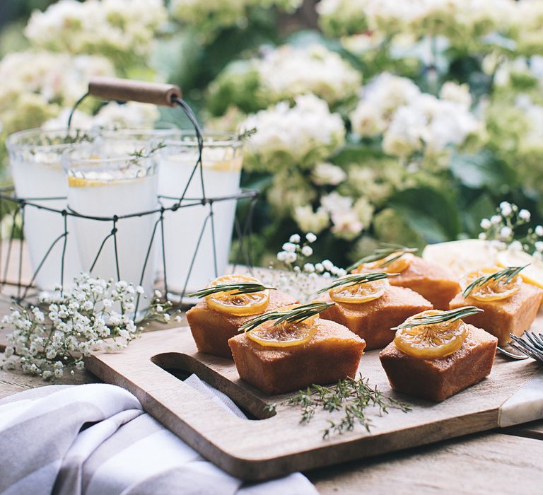 Mini Lemon Drizzle Loaves With Preserved Lemon &amp; Herb Garnish Served With Spiked Cloudy Lemonade