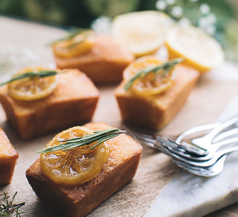 Mini Lemon Drizzle Loaves With Preserved Lemon &amp; Herb Garnish Served With Spiked Cloudy Lemonade