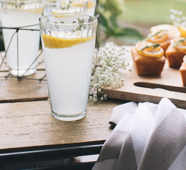 Mini Lemon Drizzle Loaves With Preserved Lemon &amp; Herb Garnish Served With Spiked Cloudy Lemonade