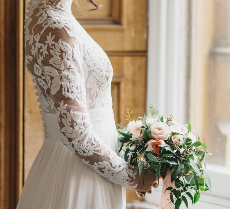 Bride in Long Sleeve Lace Suzanne Neville Wedding Dress | Blush &amp; Burgundy Floral Fairytale Wedding Inspiration at Grittleton House Planned &amp; Styled by Jennifer Louise Weddings | Katherine Yiannaki Photography