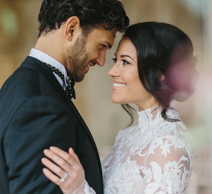 Bride in Lace Long Sleeved Suzanne Neville Wedding Dress | Groom in Traditional Morning Suit | Blush &amp; Burgundy Floral Fairytale Wedding Inspiration at Grittleton House Planned &amp; Styled by Jennifer Louise Weddings | Katherine Yiannaki Photography