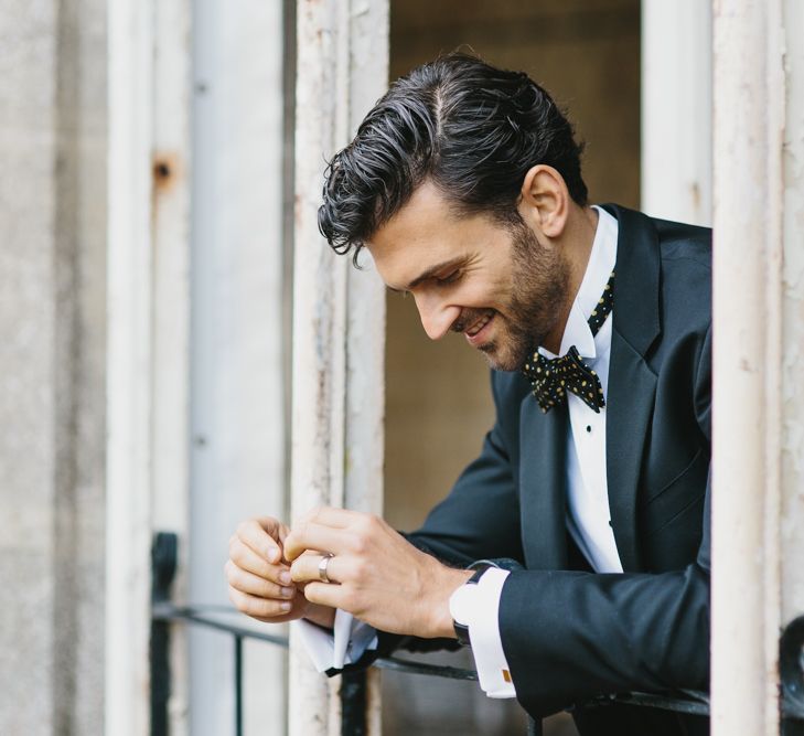 Groom Walters of Oxford Suit with Bow Tie | Blush &amp; Burgundy Floral Fairytale Wedding Inspiration at Grittleton House Planned &amp; Styled by Jennifer Louise Weddings | Katherine Yiannaki Photography