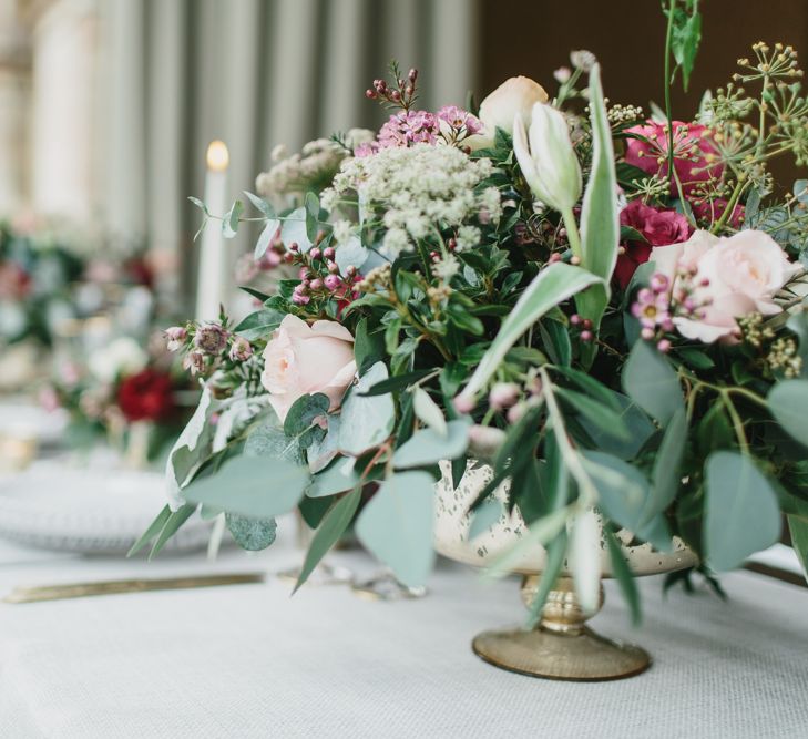 Reception Table Decor with Taper Candles &amp; Low Floral Arrangements | Blush &amp; Burgundy Floral Fairytale Wedding Inspiration at Grittleton House Planned &amp; Styled by Jennifer Louise Weddings | Katherine Yiannaki Photography