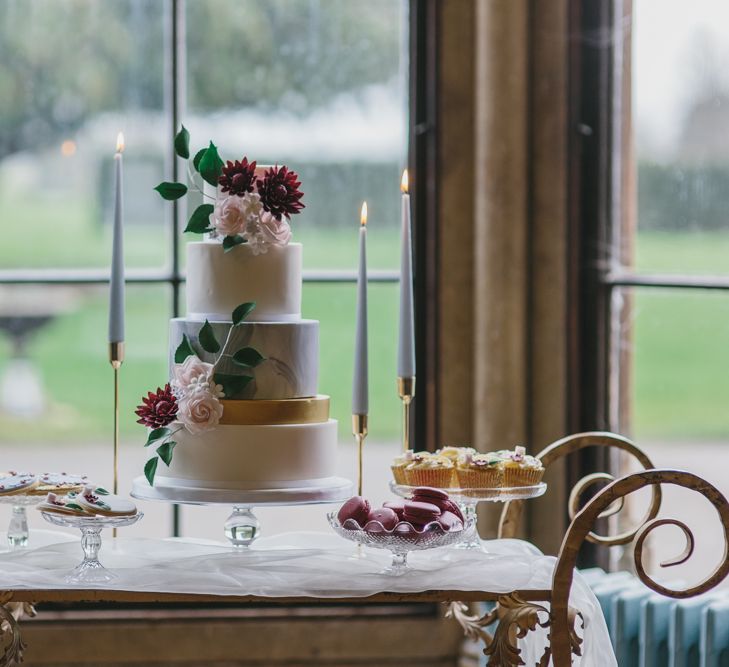 Dessert Table with Wedding Cake &amp; Treats by Lindsay Pemberton | Blush &amp; Burgundy Floral Fairytale Wedding Inspiration at Grittleton House Planned &amp; Styled by Jennifer Louise Weddings | Katherine Yiannaki Photography