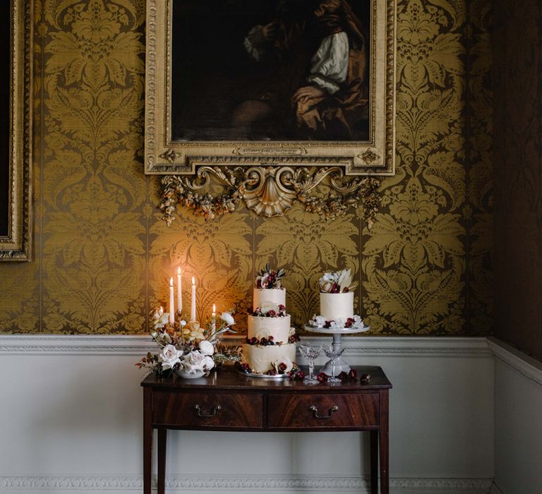 Wedding Dessert Table with Two Wedding Cakes and Taper Candle  Decor